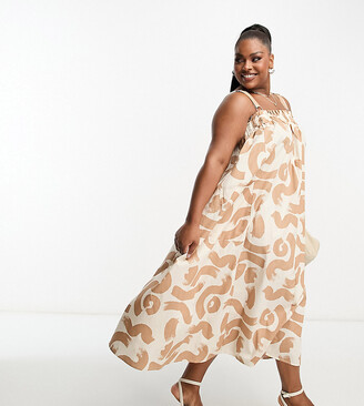 ASOS Curve ASOS DESIGN Curve cotton trapeze overall midi sundress in brown abstract print