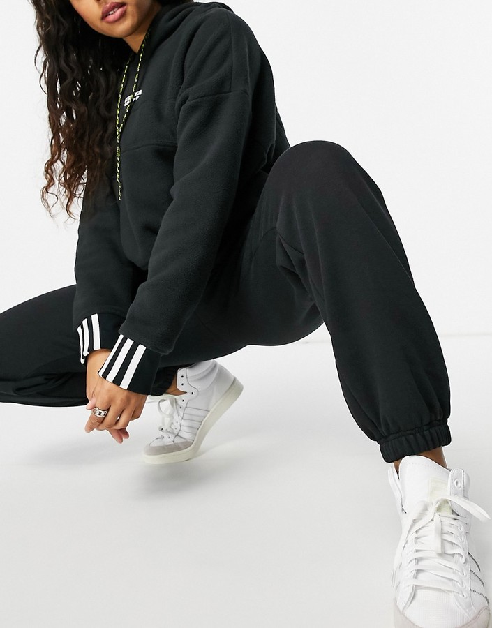 adidas 'Cosy Comfort' oversized cuffed joggers in black - ShopStyle  Activewear Trousers