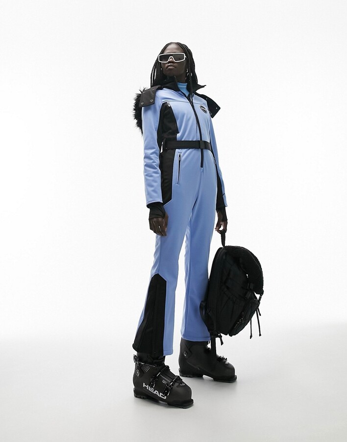 https://img.shopstyle-cdn.com/sim/ae/d0/aed0beb0a240350da12bd777f63e8a25_best/topshop-sno-ski-suit-with-faux-fur-hood-belt-in-blue.jpg