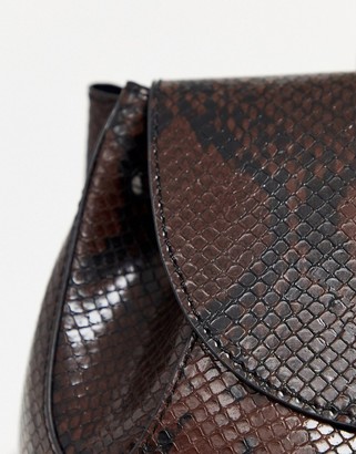 ASOS DESIGN mini soft minimal backpack in snake