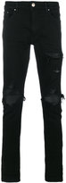 Thumbnail for your product : Amiri distressed skinny jeans
