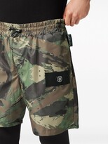 Thumbnail for your product : Plein Sport Running camouflage-print shorts