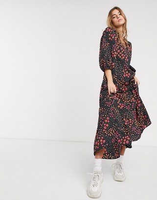 ASOS DESIGN DESIGN trapeze maxi dress with puff sleeve in mixed daisy print