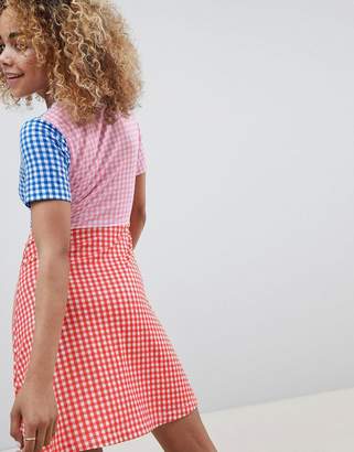 ASOS Petite DESIGN Petite mini skater dress with tie front in color block gingham