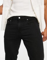 Thumbnail for your product : ASOS DESIGN skinny jeans in black with knee rips