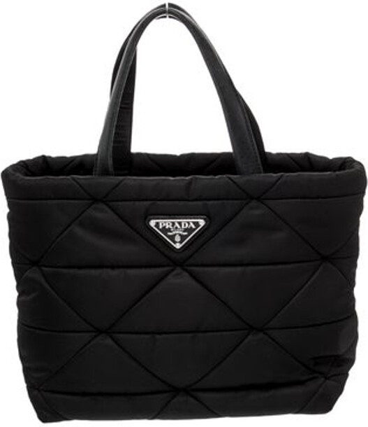 Prada Top Handle Bag From the 2021 Collection Nero Tessuto Tessuto Nylon & Enameled Metal Triangle Silver-Tone Hardware Leather Trim Flat Handles & Single Adjustable Shoulder Strap Leather Trim Embellishment Logo Jacquard Lining & Dual Interior Pockets Zip Closure at Top Includes Dust Bag & Authenticity Card