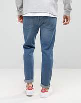 Thumbnail for your product : ASOS Tapered Jeans In Vintage Mid Wash Blue