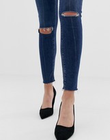 Thumbnail for your product : ASOS DESIGN Ridley high waisted skinny jeans in dark wash blue with ripped knee detail