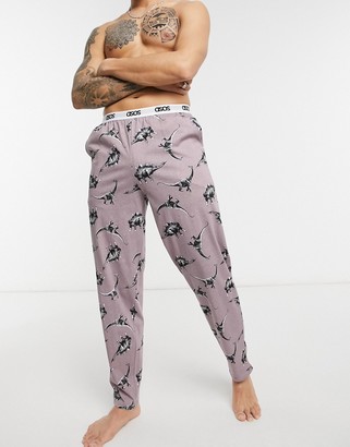 ASOS DESIGN lounge pants with dinosaur print in pink - ShopStyle Pajamas