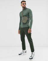 Thumbnail for your product : ASOS DESIGN DESIGN skinny long sleeve polo shirt with MA1 pocket in khaki