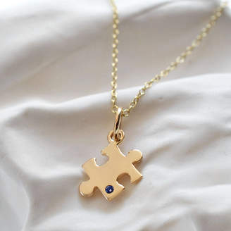 Lily Charmed Nine Carat Gold Jigsaw Puzzle Necklace With Sapphire