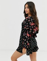 Thumbnail for your product : ASOS Petite DESIGN Petite mixed floral romper with ruffle sleeve