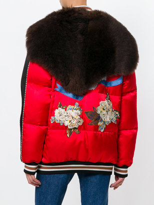 Coach skull and floral appliqué shearling trimmed bomber jacket