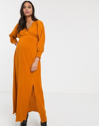 ASOS Maternity DESIGN Maternity long sleeve shirred waist maxi dress in rib in orange