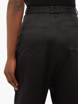 Thumbnail for your product : Balmain Pleated Silk-satin Tapered Trousers - Black