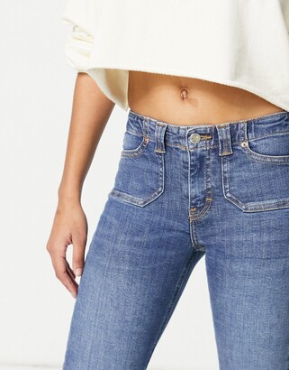 Topshop low rise flare jeans in mid blue