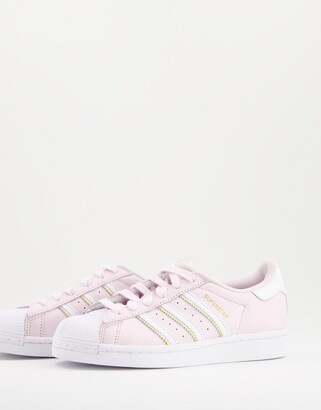 adidas Superstar sneakers in pale pink - ShopStyle Trainers & Athletic Shoes