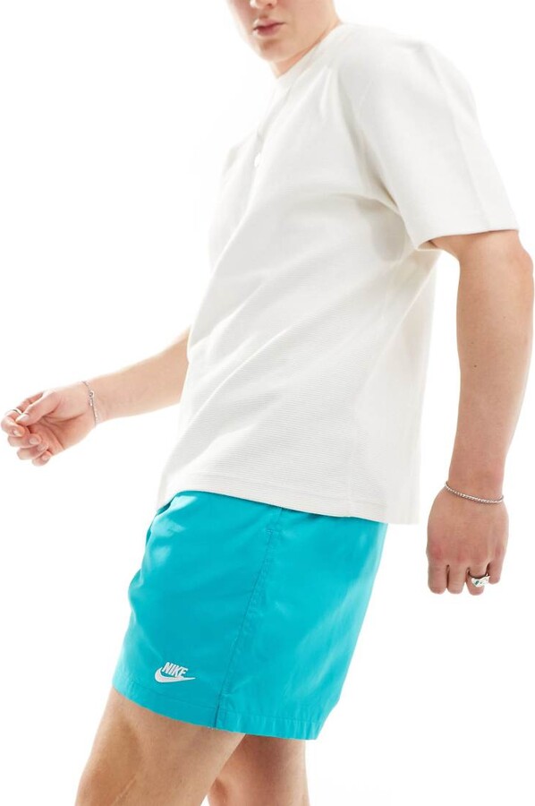 nike woven shorts turquoise