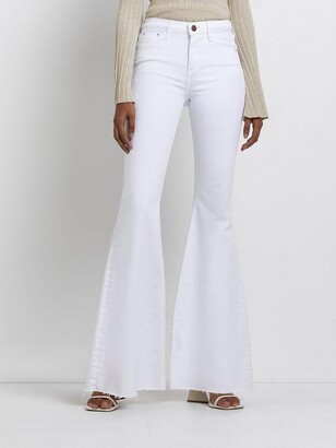 River Island Mid Rise Ultra Flared Jeans - White - ShopStyle
