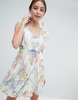 Thumbnail for your product : ASOS DESIGN ruffle sleeve mini dress in floral print with open back