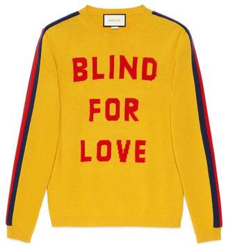 Gucci "Blind for Love" and wolf wool sweater