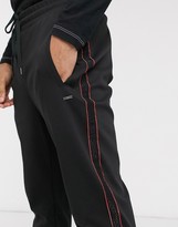 Thumbnail for your product : HUGO BOSS Davel side taped joggers in black