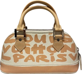 Louis Vuitton Alma Graffiti leather handbag - ShopStyle Shoulder Bags