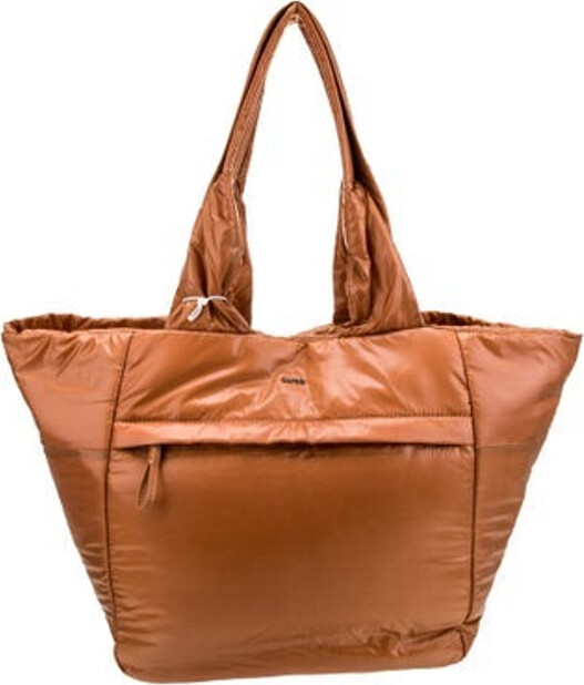 Caara Shoulder Bag Brown Nylon Gunmetal Hardware Leather Trim Dual Shoulder Straps Leather Trim Embellishment & Single Exterior Pocket Logo Jacquard Lining & Six Interior Pockets Snap Closure at Top Includes Interior Zip Pouch | Caara Nylon Shoulder Bag in Brown