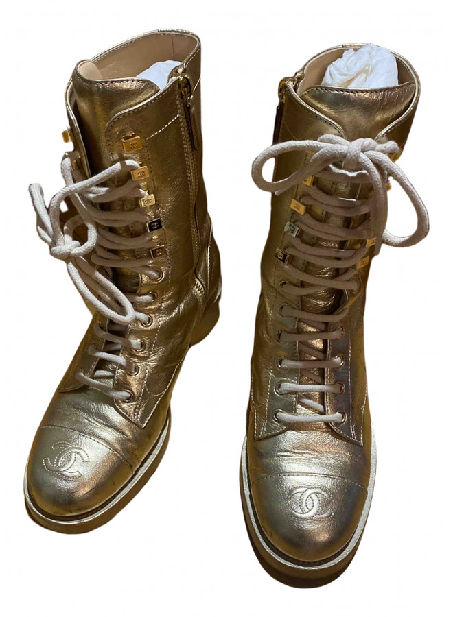 gold chanel boots