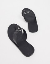 Thumbnail for your product : ASOS DESIGN Wide Fit Feline leather toe loop sandal in black
