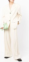 Thumbnail for your product : REJINA PYO Spencer pleated high-waist trousers
