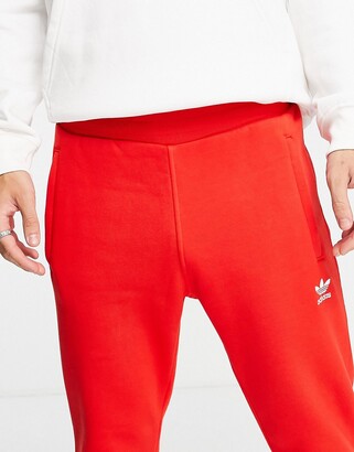 adidas essentials sweatpants in red - ShopStyle Activewear Pants
