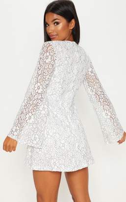 PrettyLittleThing White Lace Plunge Flare Sleeve Skater Dress