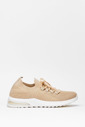 beige knitted trainers