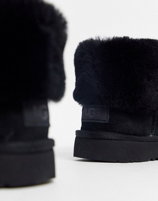 UGG Classic Mini Fluff ankle boots in black