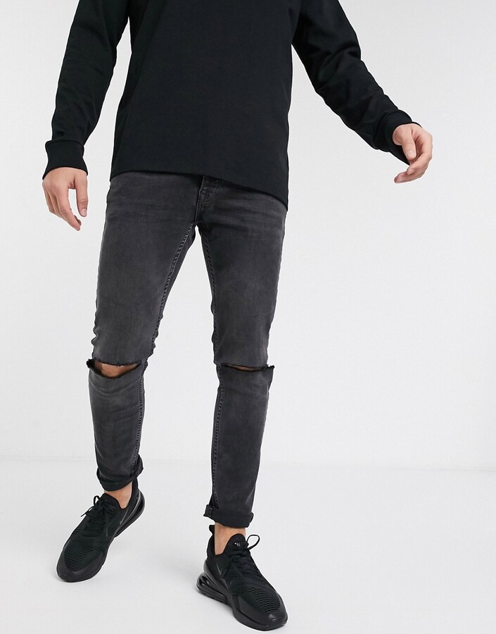 Topman stretch skinny jeans with knee rips in washed black - ShopStyle