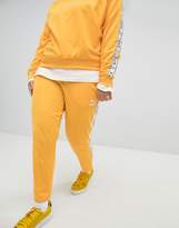 Thumbnail for your product : Puma Exclusive To ASOS Plus Taped Side Stripe Track Pants In Yellow