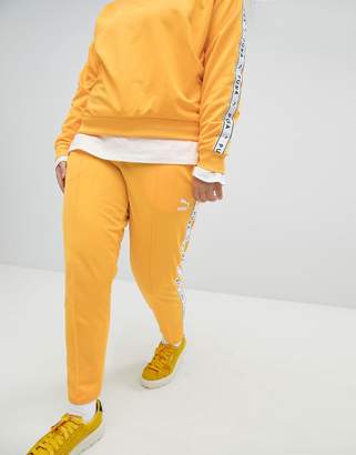 Puma Exclusive To ASOS Plus Taped Side Stripe Track Pants In Yellow