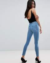 Thumbnail for your product : ASOS RIVINGTON High Waist Denim Jeggings in Mid Wash Blue