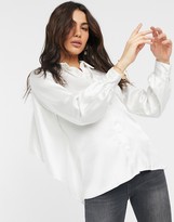 Thumbnail for your product : ASOS DESIGN long sleeve satin shirt with cut out back in ivory