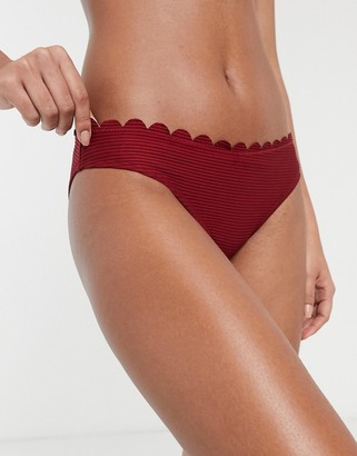 Accessorize scallop bikini bottom in berry