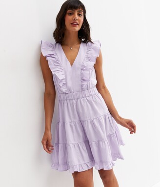 ASOS DESIGN v front v back ruffle mini dress with flutter sleeve and tie  belt in textured jacquard in purple