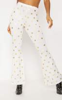 Thumbnail for your product : PrettyLittleThing White Jersey Star Print Flared Trouser