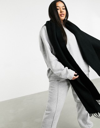 ASOS DESIGN supersoft long woven scarf with tassels in black
