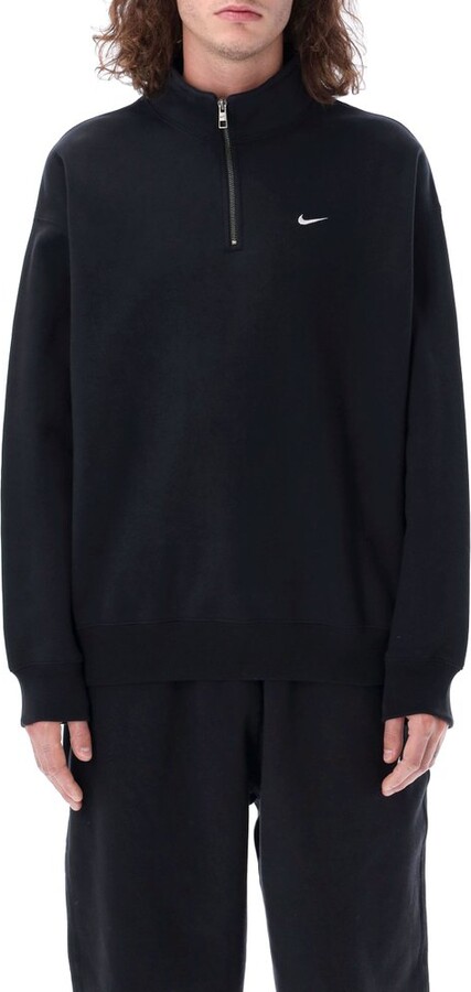 swoosh half zip