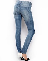 Thumbnail for your product : ASOS Whitby Low Rise Skinny Jeans in Randolph Mid Wash Blue With Ripped Knee