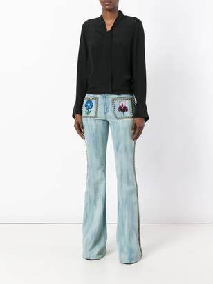 Gucci studded flared jeans