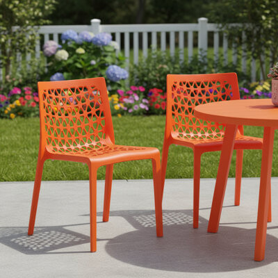 HomeRoots Set of Two Orange Heavy Duty Plastic Outdoor Stacking Dining Chairs