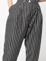 Thumbnail for your product : Casey Casey Striped Cotton Tapered Trousers