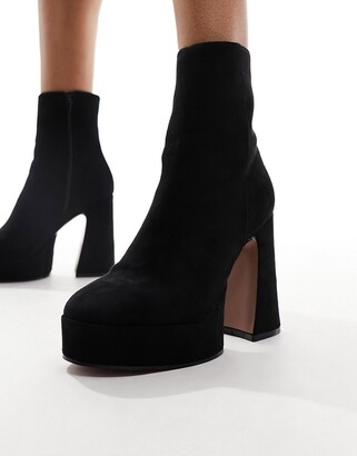 ASOS DESIGN Enchant heeled platform boots in black micro